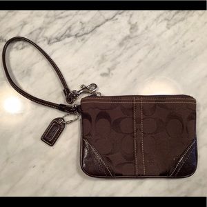 Small chocolate Coach wristlet